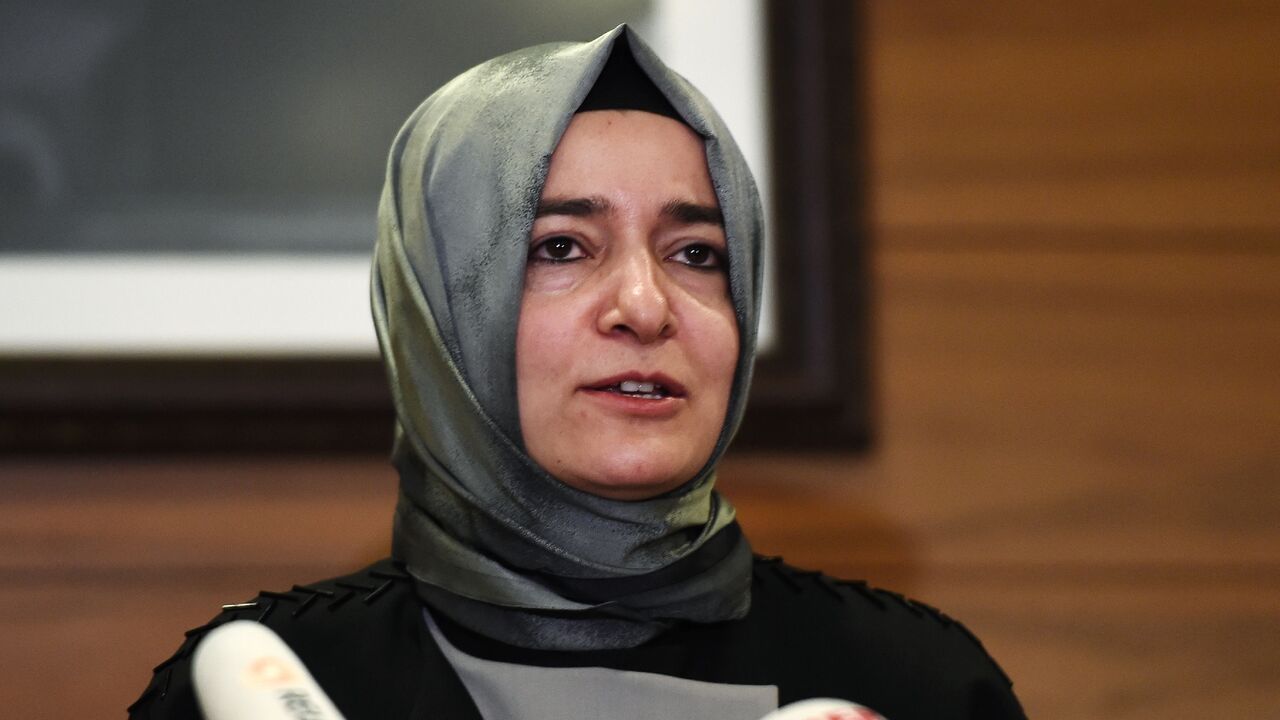 Turkey's Family Minister Fatma Betul Sayan Kaya speaks to media after arriving at the Ataturk International airport on March 12, 2017, in Istanbul. 