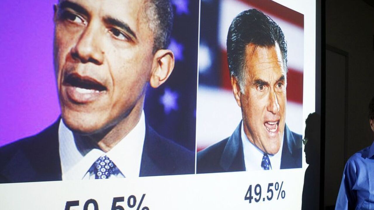 Emory professor Alan Abramowitz poses in front of a slide predicting President Barack Obama as winning the 2012 U.S. Presidential election at Emory University in Atlanta, Georgia, July 27, 2012. Abramowitz, one of the most accurate forecasters of the last few U.S. elections, sees Obama squeaking out a victory over Republican contender Mitt Romney with 50.5 percent of the vote. Like most of his peers, Abramowitz is still gathering bits of data before issuing a final prediction by the end of the summer.  Pict