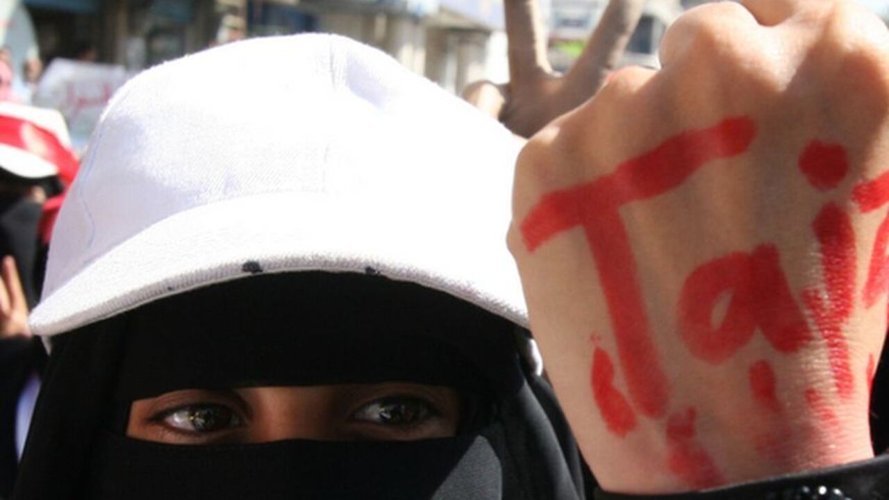 A Yemeni women wears a lock around her wrist with the name Taiz painted in red on her hand, during a demonstration in Taiz, south of the capital Sanaa on December 5, 2011. Forces loyal to Yemeni President Ali Abdullah Saleh shot dead a woman and wounded six other people when they opened fire on a crowd of protesters, medics said.
AFP PHOTO/STR (Photo credit should read -/AFP/Getty Images)