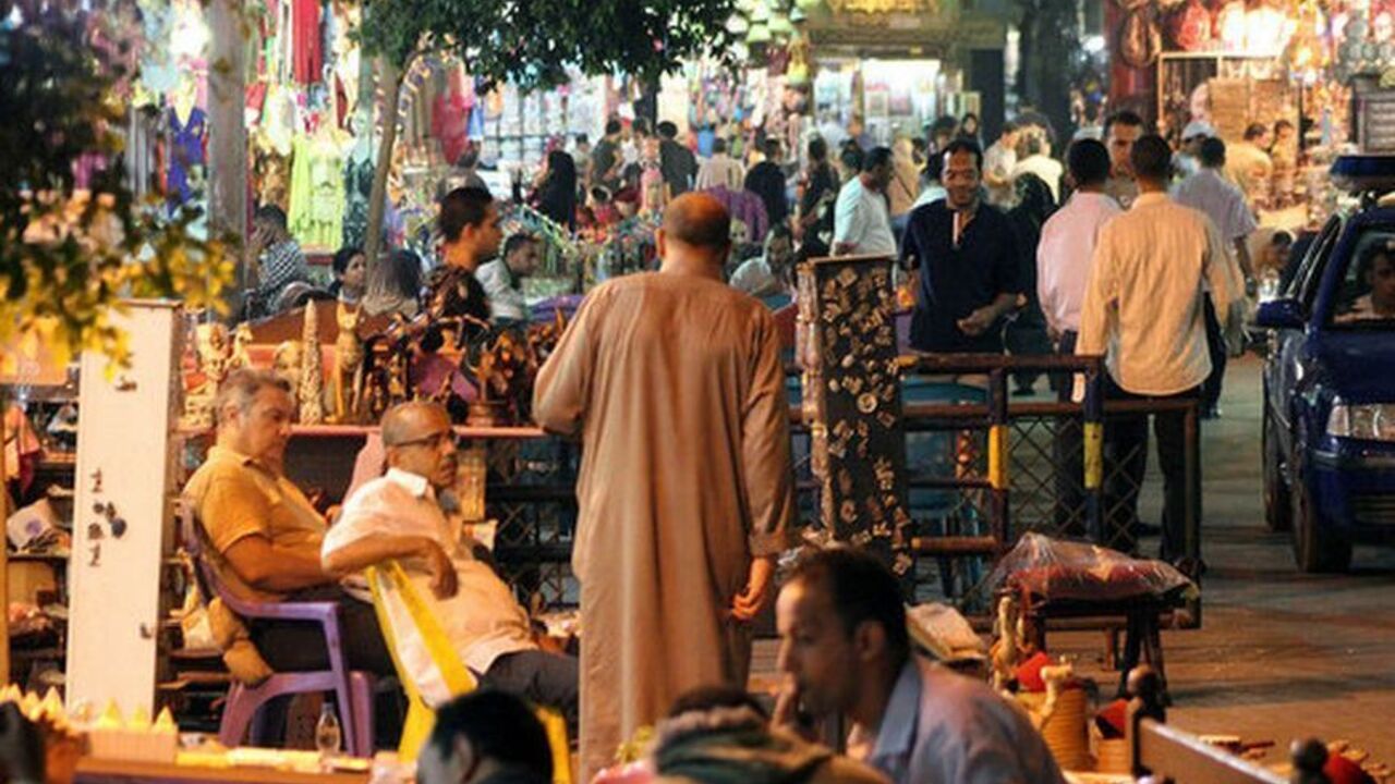 The entrance to Khan El-Khalily, Islamic Cairo's tourist market where hundreds of bazaars, jewelers, restaurants and cafes serve customers until sunrise.