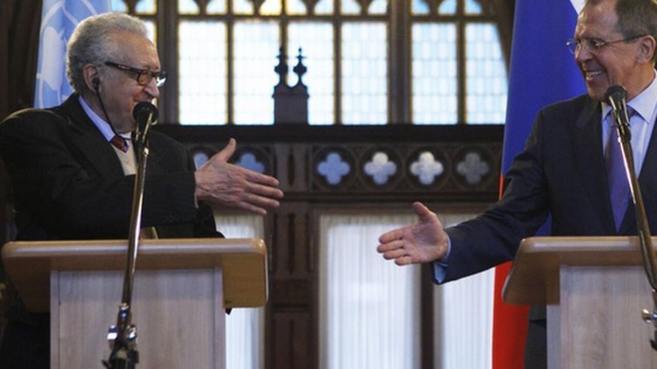 U.N.-Arab League peace mediator Lakhdar Brahimi (L) of Algeria and Russia's Foreign Minister Sergei Lavrov attend a joint news conference in Moscow December 29, 2012. The international mediator seeking to end the 21-month-old conflict in Syria met Russia's foreign minister in Moscow on Saturday after talks in Damascus but expectations of progress toward a negotiated solution were low.  REUTERS/Sergei Karpukhin (RUSSIA - Tags: POLITICS)