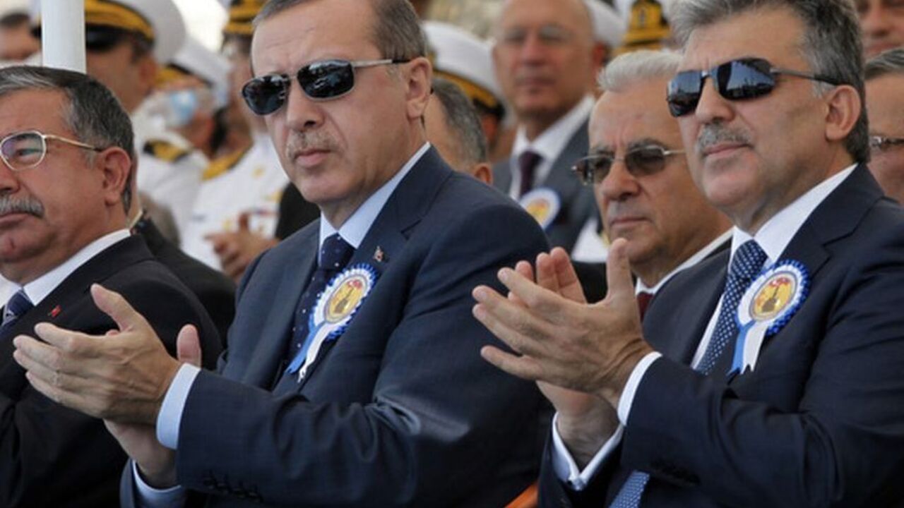 Turkey's President Abdullah Gul (R) and Turkey's Prime Minister Recep Tayyip Erdogan attend a delivery ceremony for the first nationally designed combat ship TCG Heybeliada at the Tuzla Naval shipyard in Istanbul September 27, 2011.  REUTERS/Osman Orsal (TURKEY - Tags: POLITICS MILITARY)