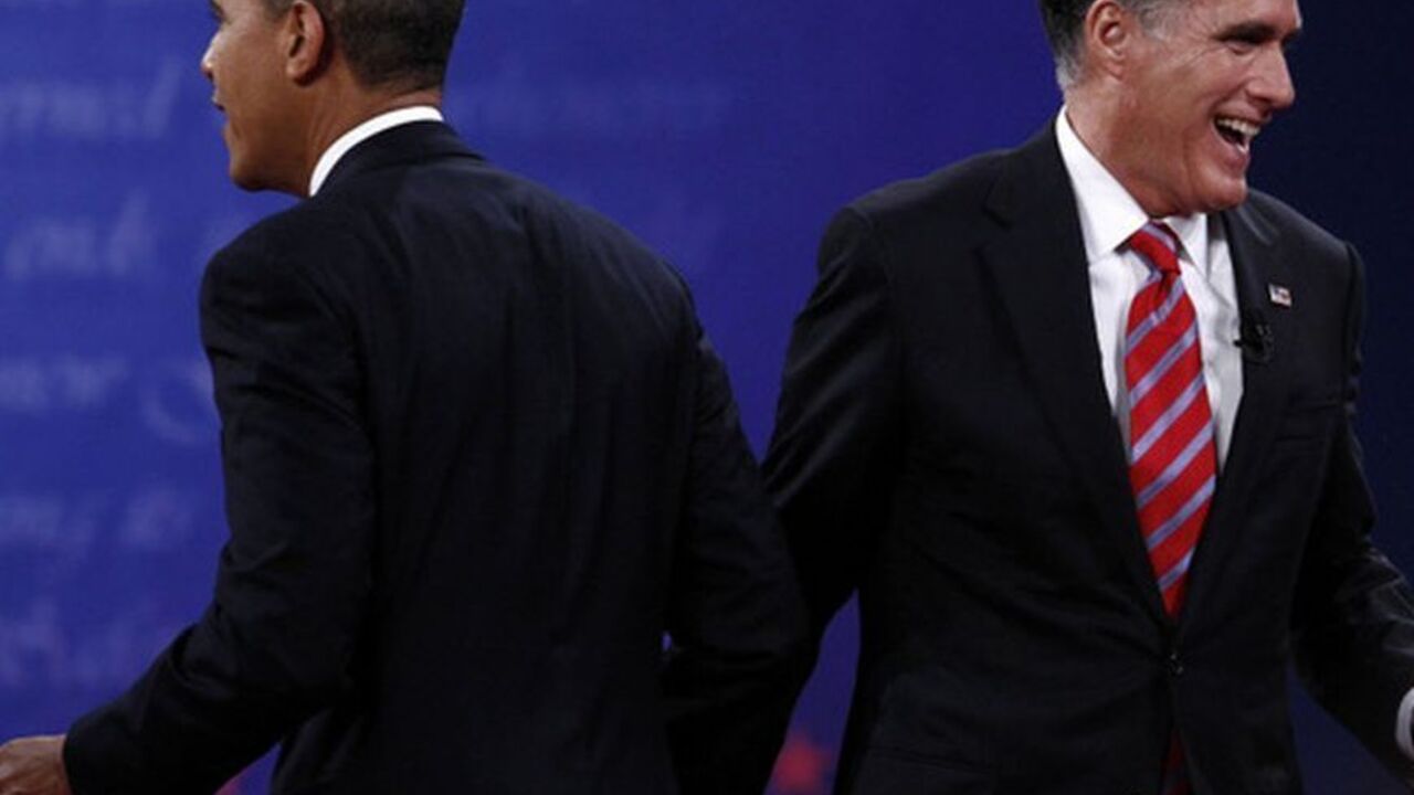 U.S. Republican presidential candidate and former Massachusetts Governor Mitt Romney and U.S. President Barack Obama walk away at the end of the final U.S. presidential debate in Boca Raton, Florida, October 22, 2012. REUTERS/Jim Young (UNITED STATES - Tags: POLITICS ELECTIONS USA PRESIDENTIAL ELECTION)
