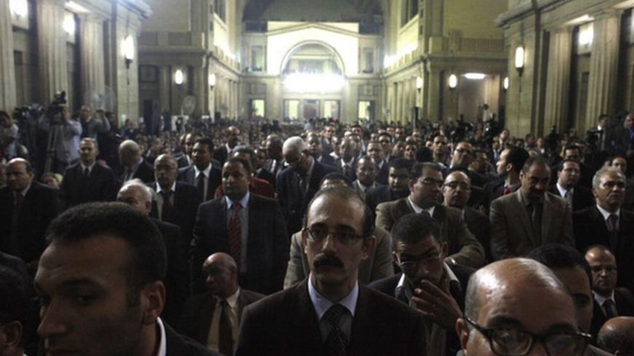 Judges attend a meeting at Egypt's Judges Club in Cairo November 24, 2012. Egyptian President Mohamed Mursi faced a rebellion on Saturday from judges who accused him of expanding his powers at their expense, deepening a crisis that triggered calls for more protests following a day of violence across Egypt. REUTERS/Asmaa Waguih (EGYPT - Tags: POLITICS)