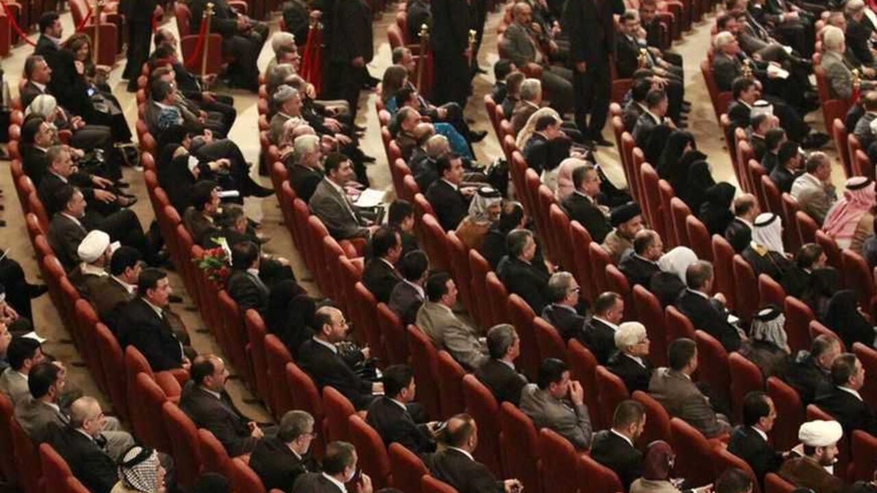 Members of the new Iraqi Parliament attend a session at the Parliament headquarters in Baghdad, November 11, 2010. Iraq's fractious politicians have agreed to return Shi'ite Nuri al-Maliki as prime minister, ending an eight-month deadlock that raised fears of renewed sectarian war, but leaving some Sunnis sceptical he can forge national unity. The pact on top government posts brings together Shi'ites, Sunnis and Kurds in a power-sharing arrangement similar to the last Iraqi government and could help prevent