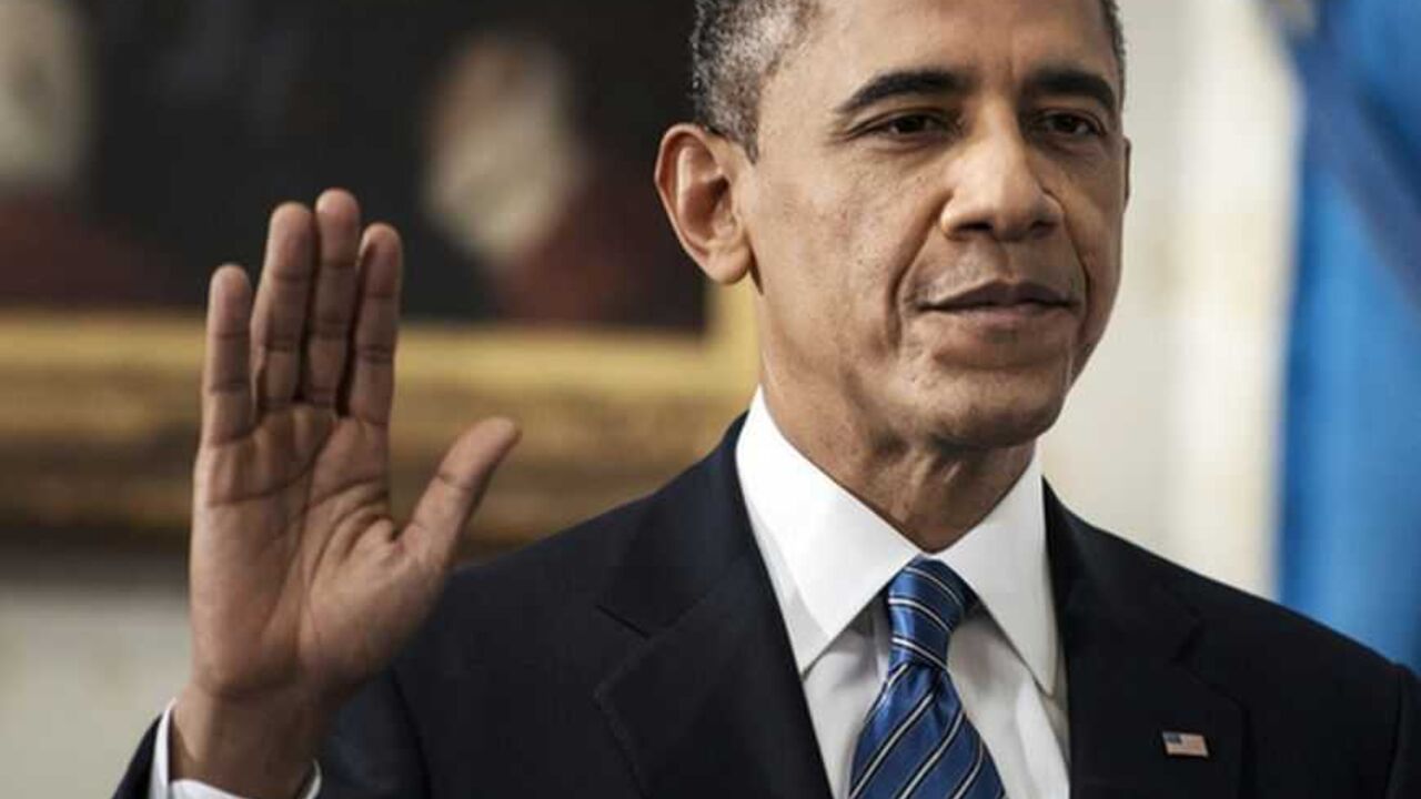 U.S. President Barack Obama is sworn in for a second term as President of the United States in the Blue Room of the White House in Washington, DC January 20, 2013.   REUTERS/Brendan Smialowski/Pool (UNITED STATES  - Tags: POLITICS)