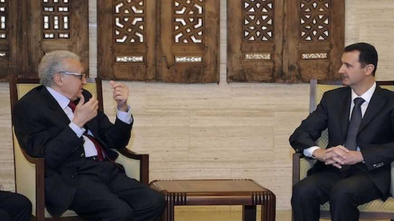 Syria's President Bashar al-Assad (R) meets International peace envoy for Syria Lakhdar Brahimi in Damascus December 24, 2012 in this handout photograph released by Syria's national news agency SANA. Brahimi met with Assad in Damascus on Monday to discuss a solution to the country's 21-month-old conflict. Brahimi told journalists after the meeting that he discussed the situation in Syria overall and gave his views on how to solve the crisis. He said conditions in the country were still poor. REUTERS/Sana (S