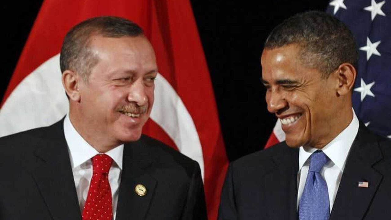 U.S. President Barack Obama (R) and Turkey's Prime Minister Recep Tayyip Erdogan talk to members of the press after a bilateral meeting ahead of the Nuclear Security Summit in Seoul March 25, 2012.     REUTERS/Larry Downing        (SOUTH KOREA - Tags: POLITICS MILITARY) - RTR2ZUEN