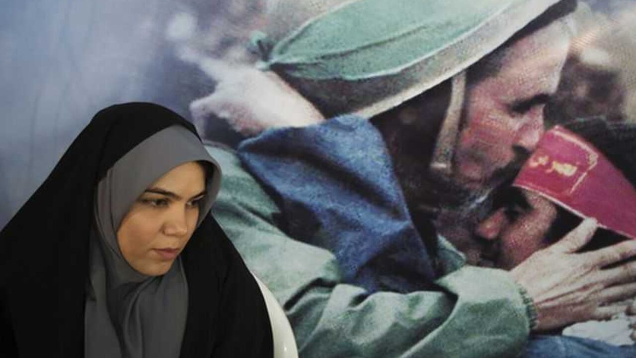 EDITORS' NOTE: Reuters and other foreign media are subject to Iranian restrictions on leaving the office to report, film or take pictures in Tehran.

An election official sits in front of an image of Iranian warriors at a mosque, used as a polling station, during the parliamentary election in central Tehran March 2, 2012. Iranians voted on Friday in a parliamentary election which is expected to reinforce the power of the clerical establishment of Supreme Leader Ayatollah Ali Khamenei over hardline politic