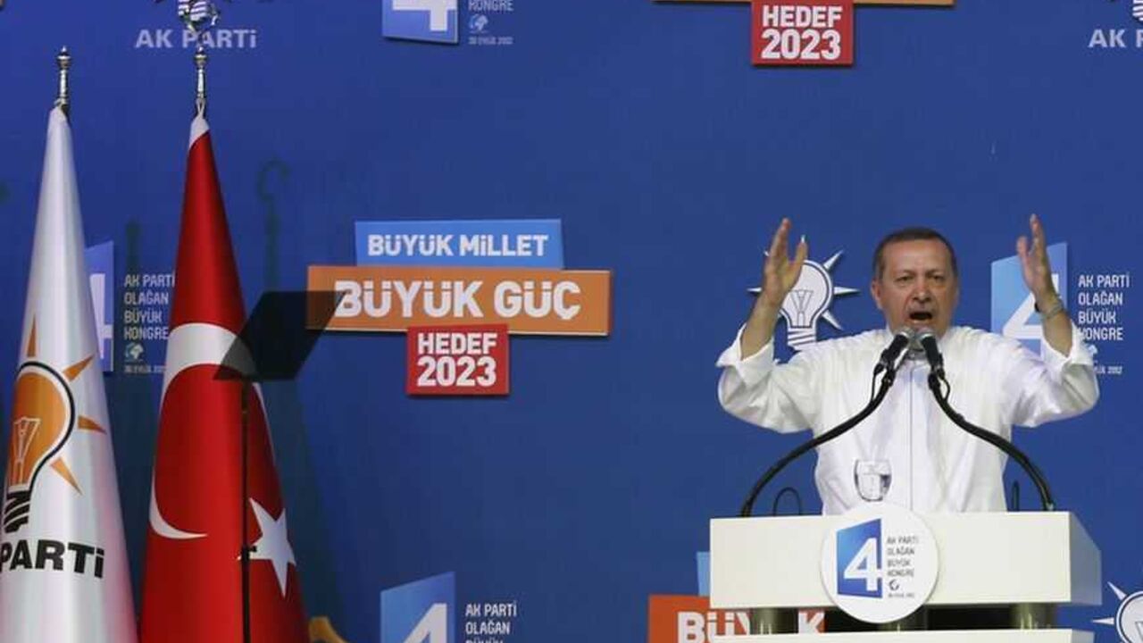Turkey's Prime Minister and leader of ruling Justice and Development Party (AKP) Tayyip Erdogan makes his address during his party congress in Ankara September 30, 2012. REUTERS/Murad Sezer (TURKEY - Tags: POLITICS) - RTR38LX3