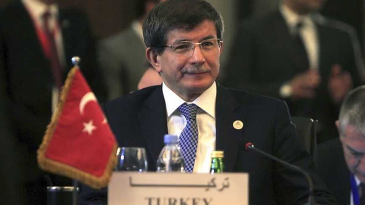 Turkish Foreign Minister Ahmet Davutoglu attends a foreign ministers meeting ahead of the Organisation of Islamic Cooperation (OIC) summit in Cairo February 4, 2013. The OIC summit will be held from February 6-7. REUTERS/Mohamed Abd El Ghany  (EGYPT - Tags: POLITICS) - RTR3DCET