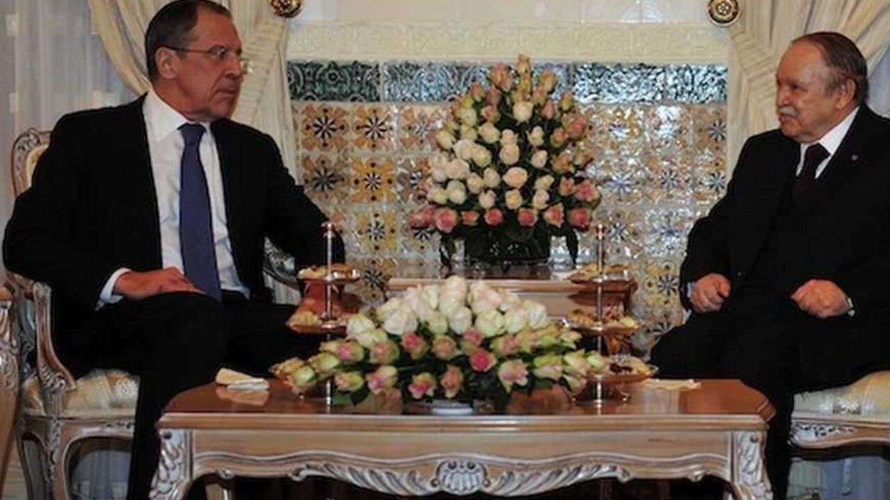 Algeria's President Abdelaziz Bouteflika (R) meets Russia's Foreign Minister Sergei Lavrov at the presidential palace in Algiers February 11, 2013. REUTERS/Stringer (ALGERIA - Tags: POLITICS) - RTR3DNG9