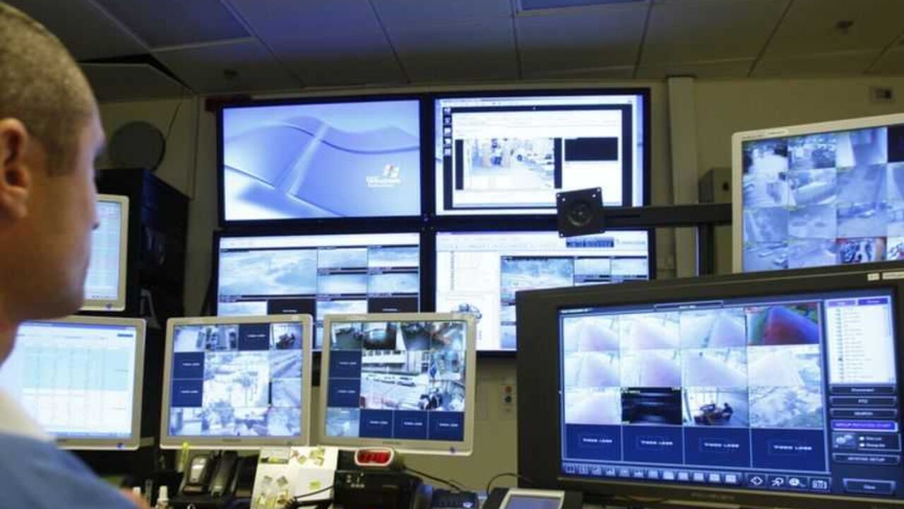 Aviram Yaacov, computer systems coordinator at Ben Gurion University's security department, uses BriefCam's video synopsis programme at the university in the southern city of Beersheba January 16, 2011. As the world becomes increasingly saturated with closed circuit television (CCTV) cameras, security experts say offenders can easily slip away simply because no one had the time to find the incriminating footage. Israeli company BriefCam hopes to change that with a new computer programme, called video synops