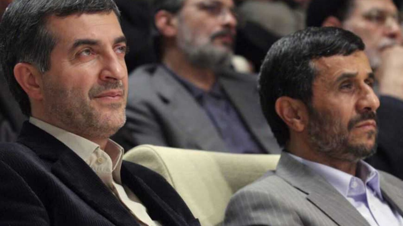 Iran's President Mahmoud Ahmadinejad (R) and First Vice President Esfandiar Rahim Mashaei attend a ceremony in Tehran July 22, 2009. Ahmadinejad, re-elected for a second four-year term in a disputed presidential vote last month, has come under fire from fellow conservatives and hardliners for appointing Mashaie last Thursday. 
REUTERS/Yalda Moaiery (IRAN POLITICS) - RTR25XJ8