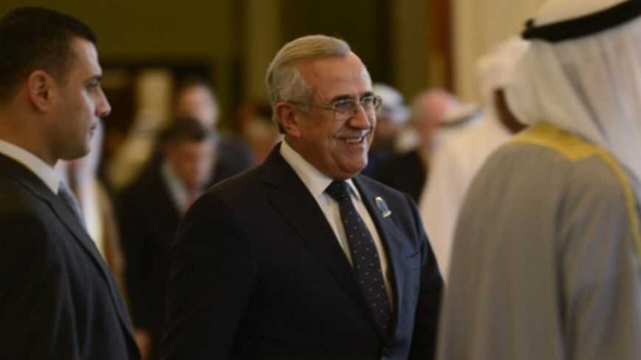Lebanese President Michel Suleiman walks to a luncheon held during the International Humanitarian Pledging Conference for Syria at Bayan Palace on the outskirts of Kuwait City January 30, 2013. REUTERS/Stephanie McGehee (KUWAIT - Tags: POLITICS) - RTR3D560