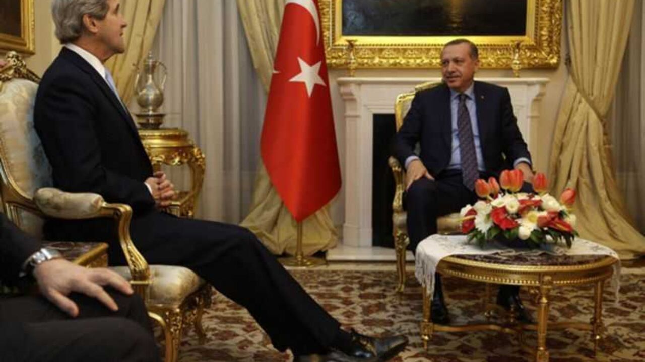 U.S. Secretary of State John Kerry (L) meets with Turkish Prime Minister Tayyip Erdogan at Ankara Palace in Ankara, March 1, 2013. Kerry said on Friday the United States found a comment by Turkey's prime minister, likening Zionism to crimes against humanity, "objectionable", overshadowing their talks on the crisis in neighbouring Syria. REUTERS/Jacquelyn Martin/Pool (TURKEY - Tags: POLITICS) - RTR3EG8P