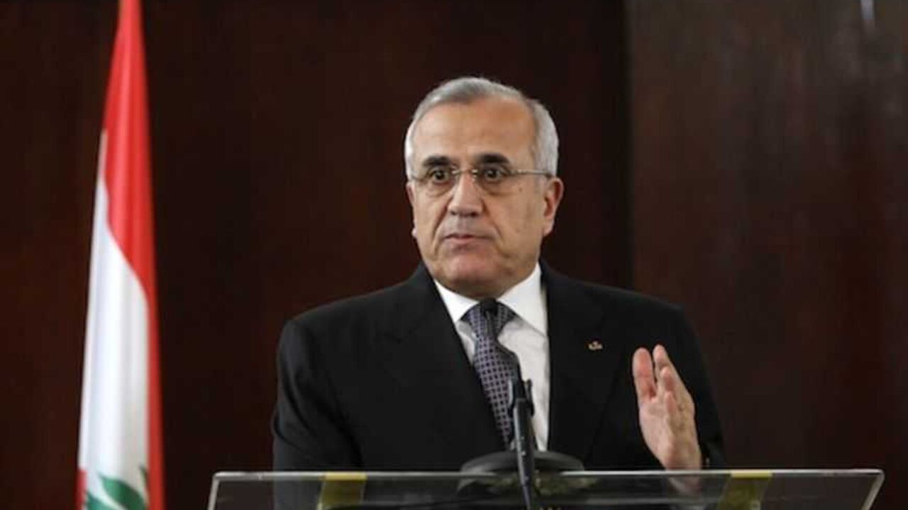 Lebanon's President Michel Suleiman talks during a news conference with Ivory Coast's President Alassane Ouattara at the presidential palace in Abidjan March 15, 2013. Suleiman visits the Ivory Coast as part of his official West Africa trip. REUTERS/Luc Gnago (IVORY COAST - Tags: POLITICS) - RTR3F1EZ