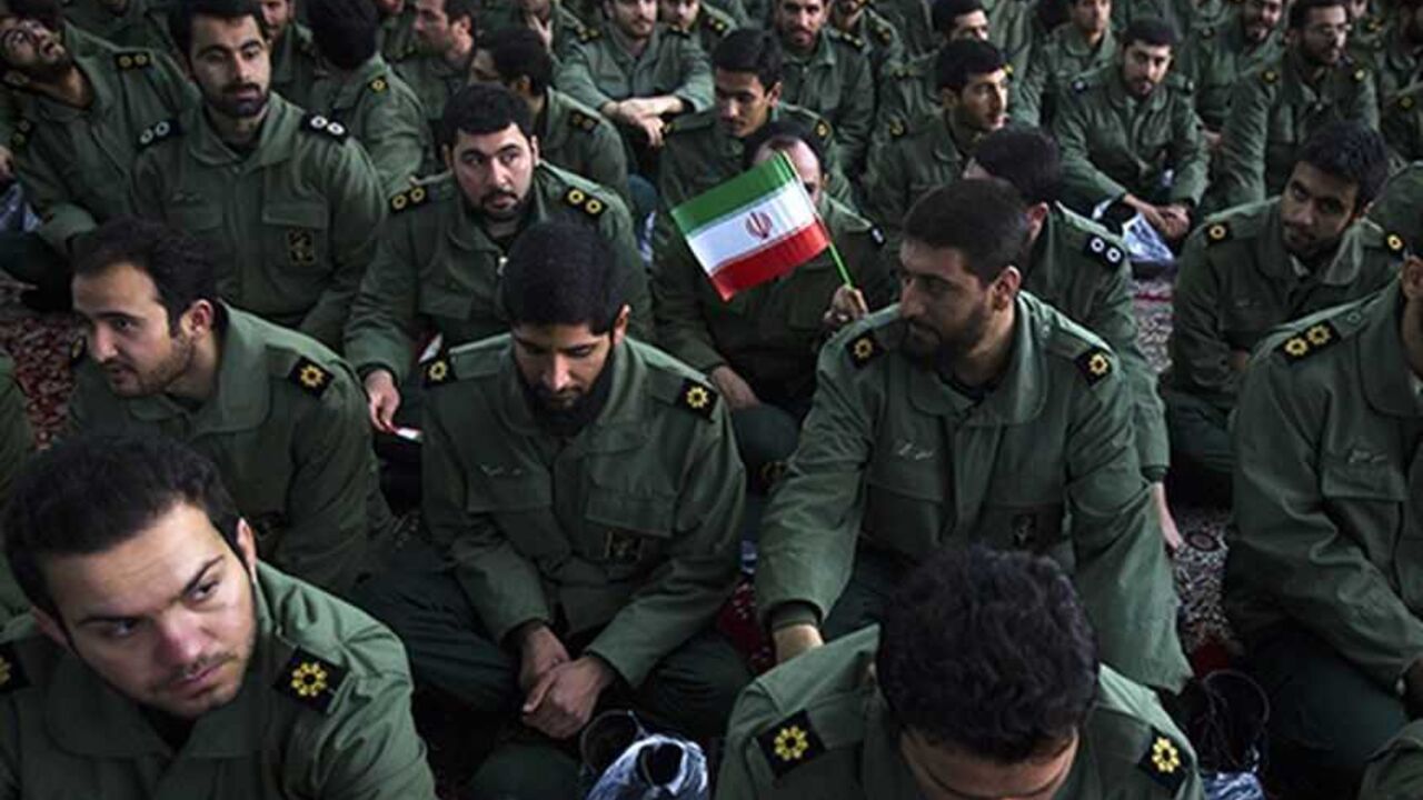 EDITORS' NOTE: Reuters and other foreign media are subject to Iranian restrictions on leaving the office to report, film or take pictures in Tehran.

Members of the revolutionary guard attend the anniversary ceremony of Iran's Islamic Revolution at the Khomeini shrine in the Behesht Zahra cemetery, south of Tehran, February 1, 2012. REUTERS/Raheb Homavandi  (IRAN - Tags: POLITICS ANNIVERSARY MILITARY) - RTR2X5DT