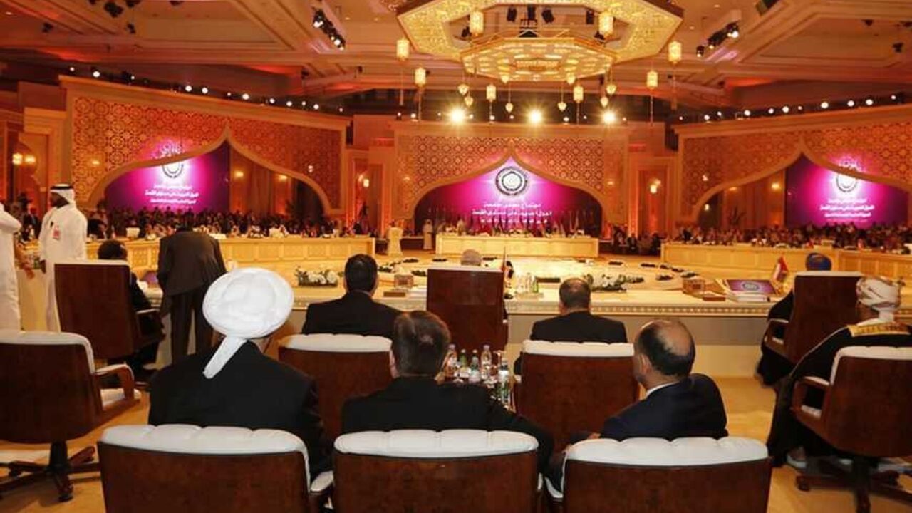 Leaders from Arab states are seen attending the opening of the Arab League summit in Doha March 26, 2013. A summit of Arab heads of state opened in the Qatari capital Doha on Tuesday expected to focus on the war in Syria as well as on the Israeli-Palestinian conflict.  REUTERS/Ahmed Jadallah (QATAR - Tags: POLITICS) - RTXXXR4