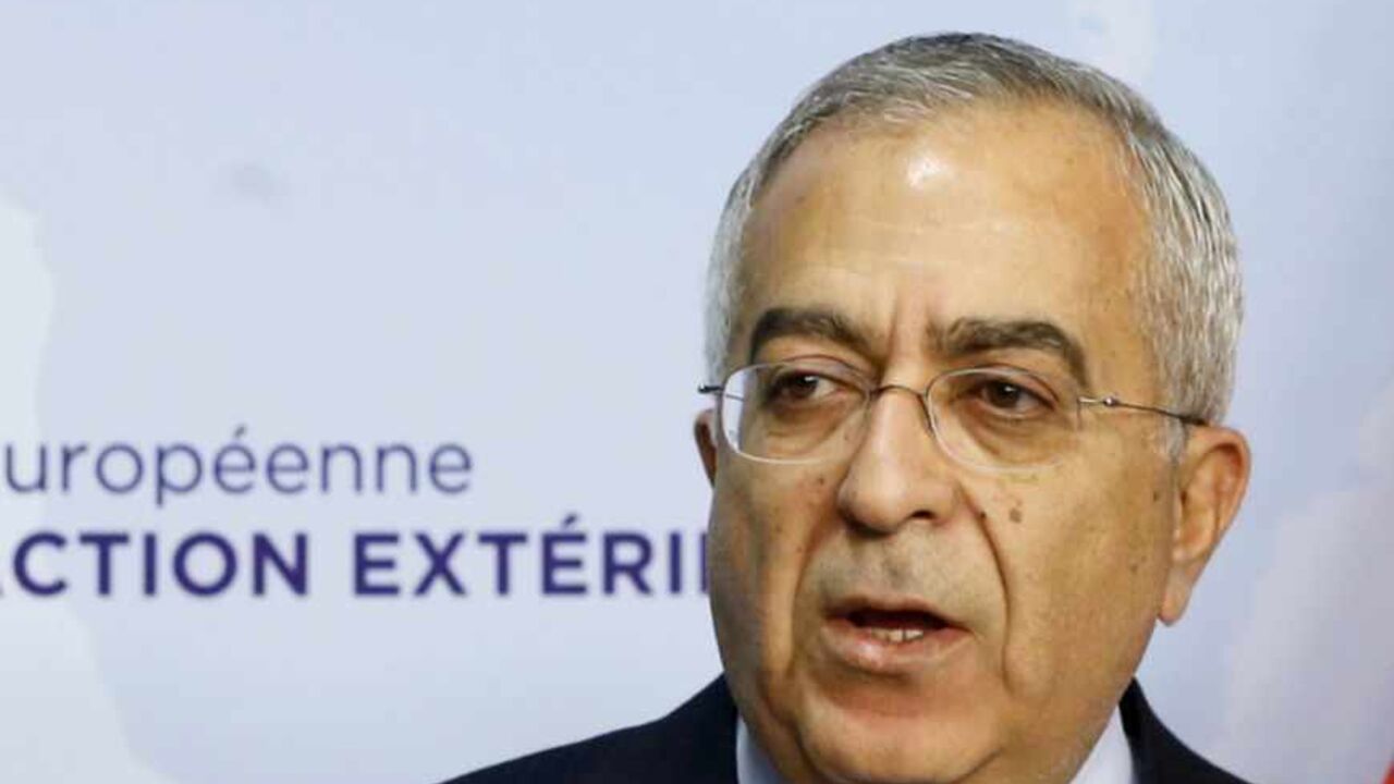 Palestinian Prime Minister Salam Fayyad speaks during a joint news conference with European Union foreign policy chief Catherine Ashton (unseen) in Brussels March 19, 2013. REUTERS/Francois Lenoir (BELGIUM - Tags: POLITICS) - RTR3F6PV