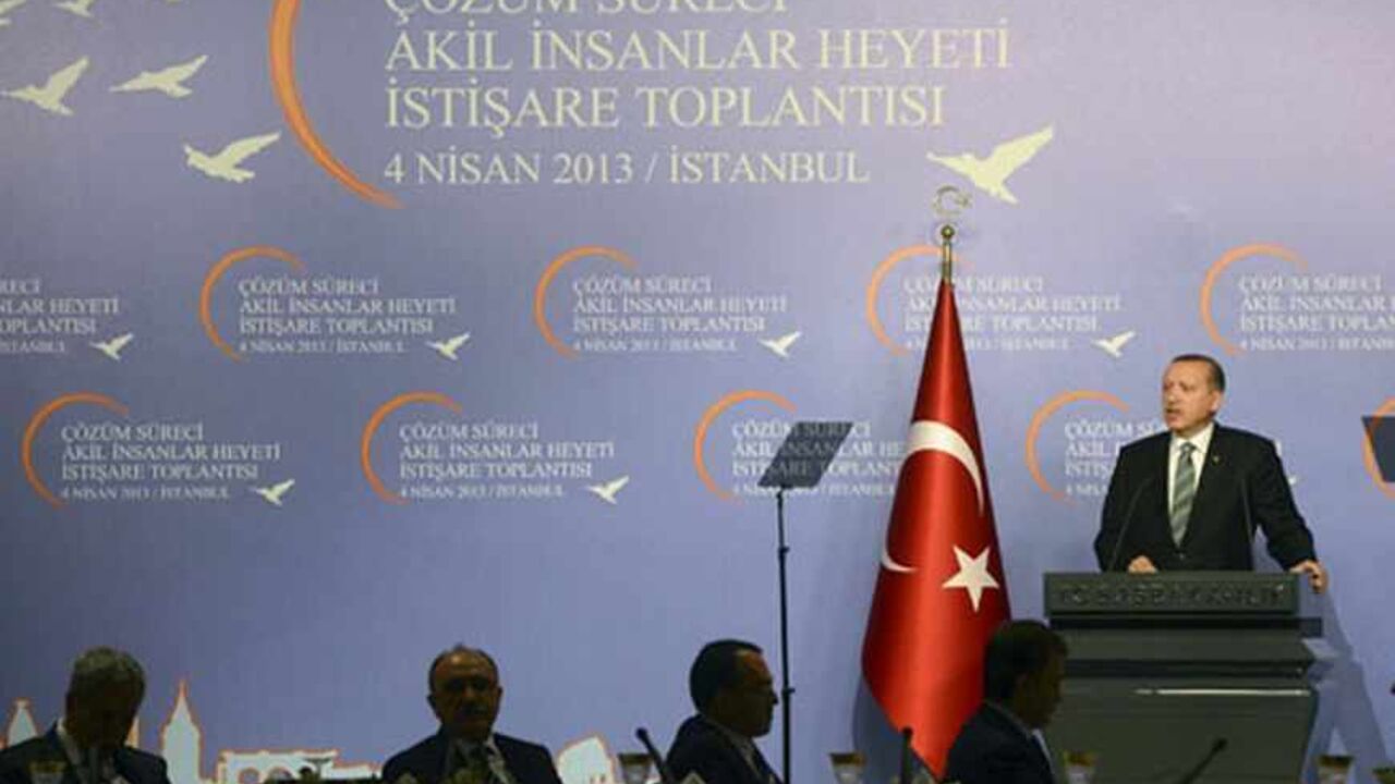 Turkey's Prime Minister Tayyip Erdogan makes his address during a meeting with the 'wise people' commission in Istanbul April 4, 2013. Erdogan chaired an inaugural meeting of the 'wise people' commission, who will be consulted on a peace process with Kurdish militants. The commission is made up of academics, journalists and performing artists, and established by the government to promote the peace process nationwide. REUTERS/Metin Pala/Pool (TURKEY - Tags: POLITICS CIVIL UNREST) - RTXY8E6