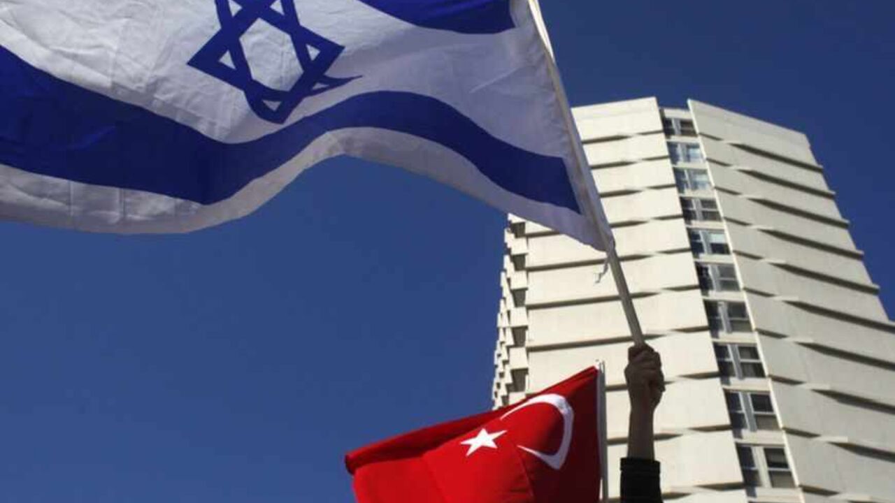Employees from a Turkish-owned company in Israel protest against the recent tensions between the two countries outside the Turkish embassy in Tel Aviv December 28, 2010. Israel will not apologise to Turkey for a May raid on a Turkish-led convoy that killed nine Turkish  activists and talks to mend ties have so far fallen short, Prime Minister Benjamin Netanyahu said on Monday.  REUTERS/Nir Elias (ISRAEL - Tags: POLITICS) - RTXW1ZV