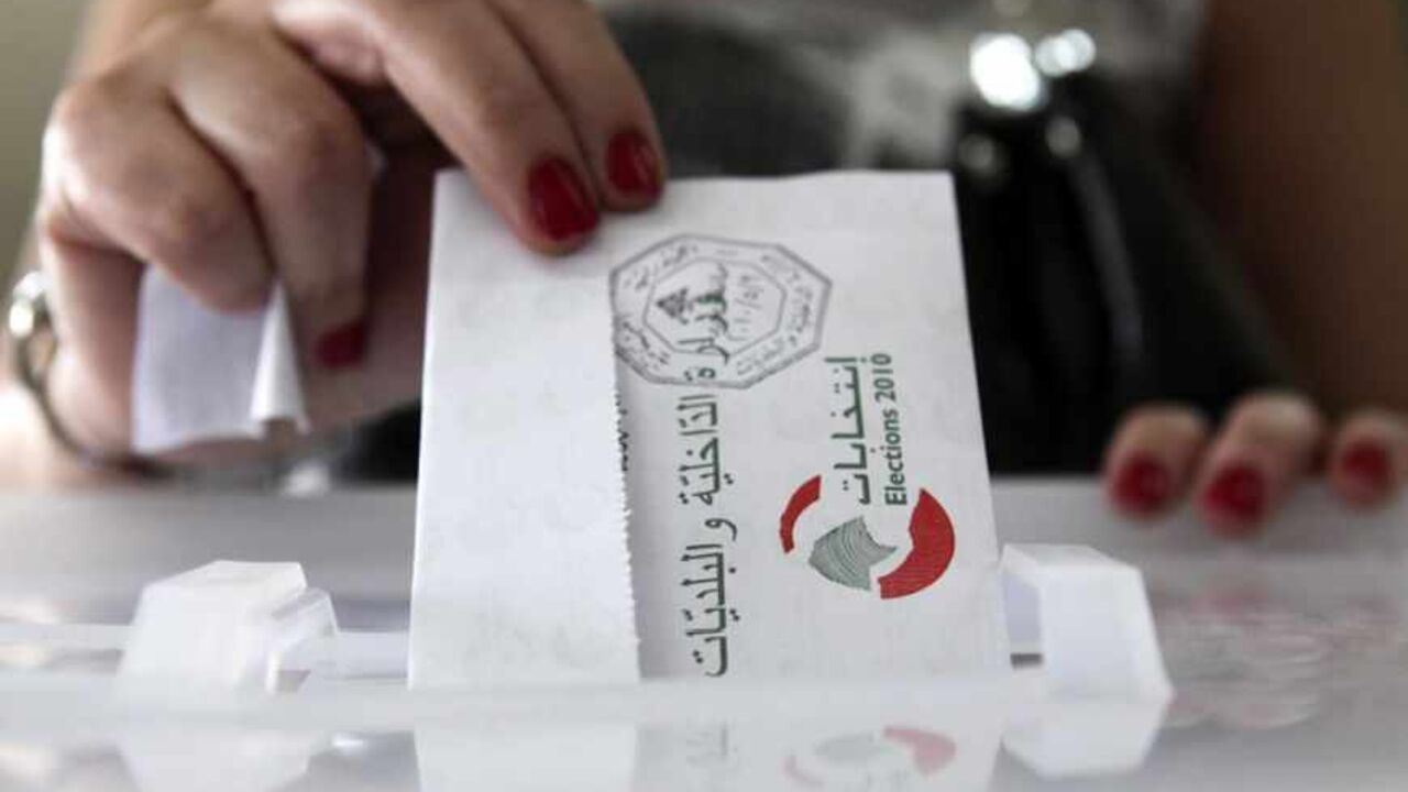 A woman casts her ballot at a polling station during the country's municipal elections in Beirut May 9, 2010. The voting is spread across four regions, each of which will vote on a Sunday in May. Beirut is the second region to vote today. REUTERS/ Cynthia Karam  (LEBANON - Tags: ELECTIONS POLITICS) - RTR2DNI2