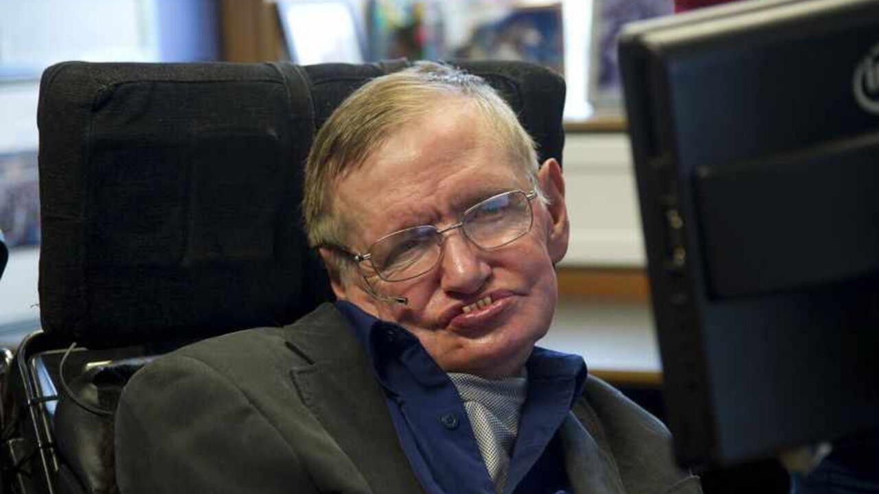 British physicist Stephen Hawking sits at his desk in the Applied Mathematics Department of Cambridge University August 30, 2012. Hawking met Ecuadorean Vice-President Lenin Moreno, who invited Hawking to visit the Galapagos Islands and the Yasuni Ecological Reserve in Ecuador. REUTERS/Guillermo Granja/Vice Presidency of Ecuador/Handout (BRITAIN - Tags: SCIENCE TECHNOLOGY POLITICS HEADSHOT SOCIETY) FOR EDITORIAL USE ONLY. NOT FOR SALE FOR MARKETING OR ADVERTISING CAMPAIGNS - RTR37AGP