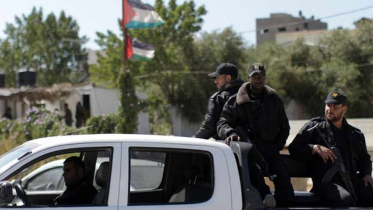 Hamas security men stand guard on the border between Gaza city and Israel to prevent any Palestinian collaborators from escaping to Israel on April 10, 2013. Hamas accused Western and Arab spy agencies of operating in the Gaza Strip and said it had a list of alleged collaborators. AFP PHOTO/MAHMUD HAMS        (Photo credit should read MAHMUD HAMS/AFP/Getty Images)