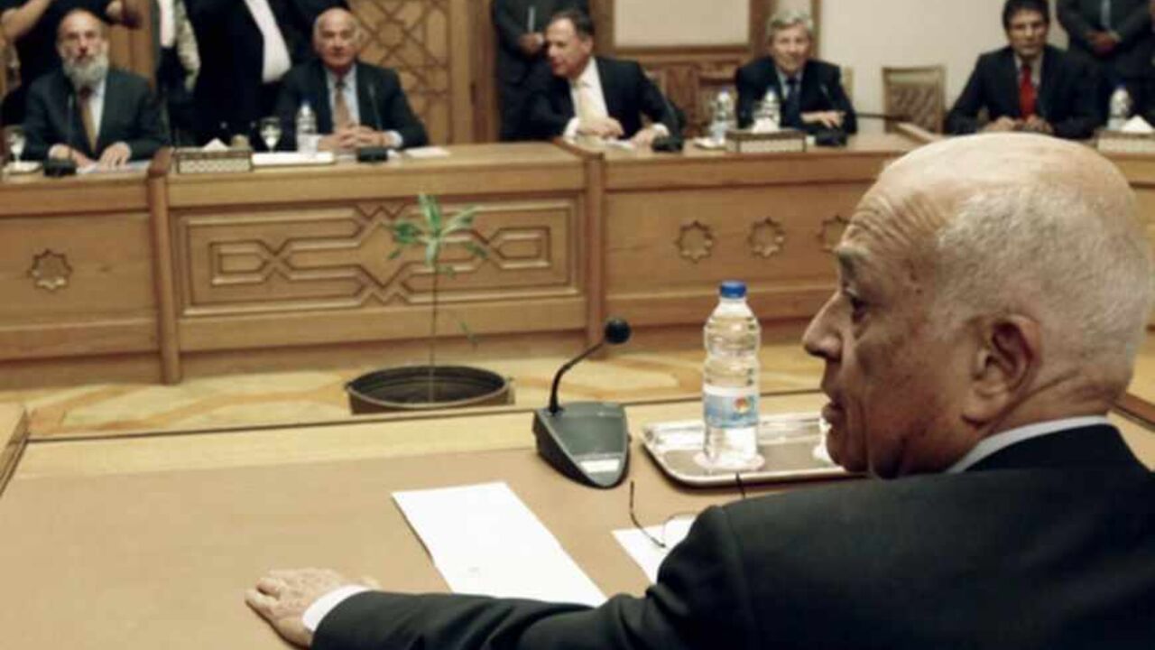 Egypt's Foreign Minister Nabil Elaraby (R) attends a meeting with former chief of Israel's Shin Bet intelligence agency Jacob Perry and the delegation from "Israeli Peace Initiative" group, lobbying its government to concede land to Palestinians for peace, in Cairo May 19, 2011. REUTERS/Mohamed Abd El-Ghany  (EGYPT - Tags: POLITICS CIVIL UNREST) - RTR2MMIG