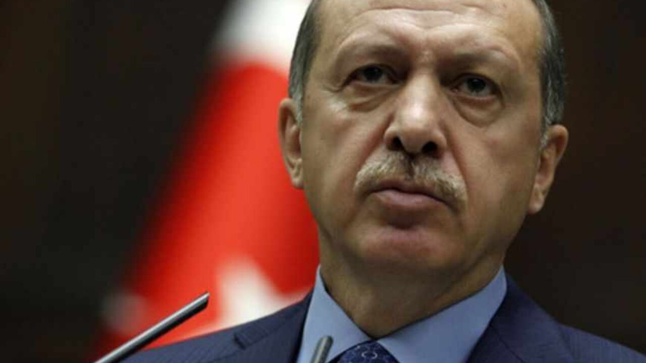 Turkey's Prime Minister Tayyip Erdogan addresses members of parliament from his ruling AK Party (AKP) during a meeting at the Turkish parliament in Ankara May 7, 2013. REUTERS/Umit Bektas (TURKEY - Tags: POLITICS) - RTXZDDJ