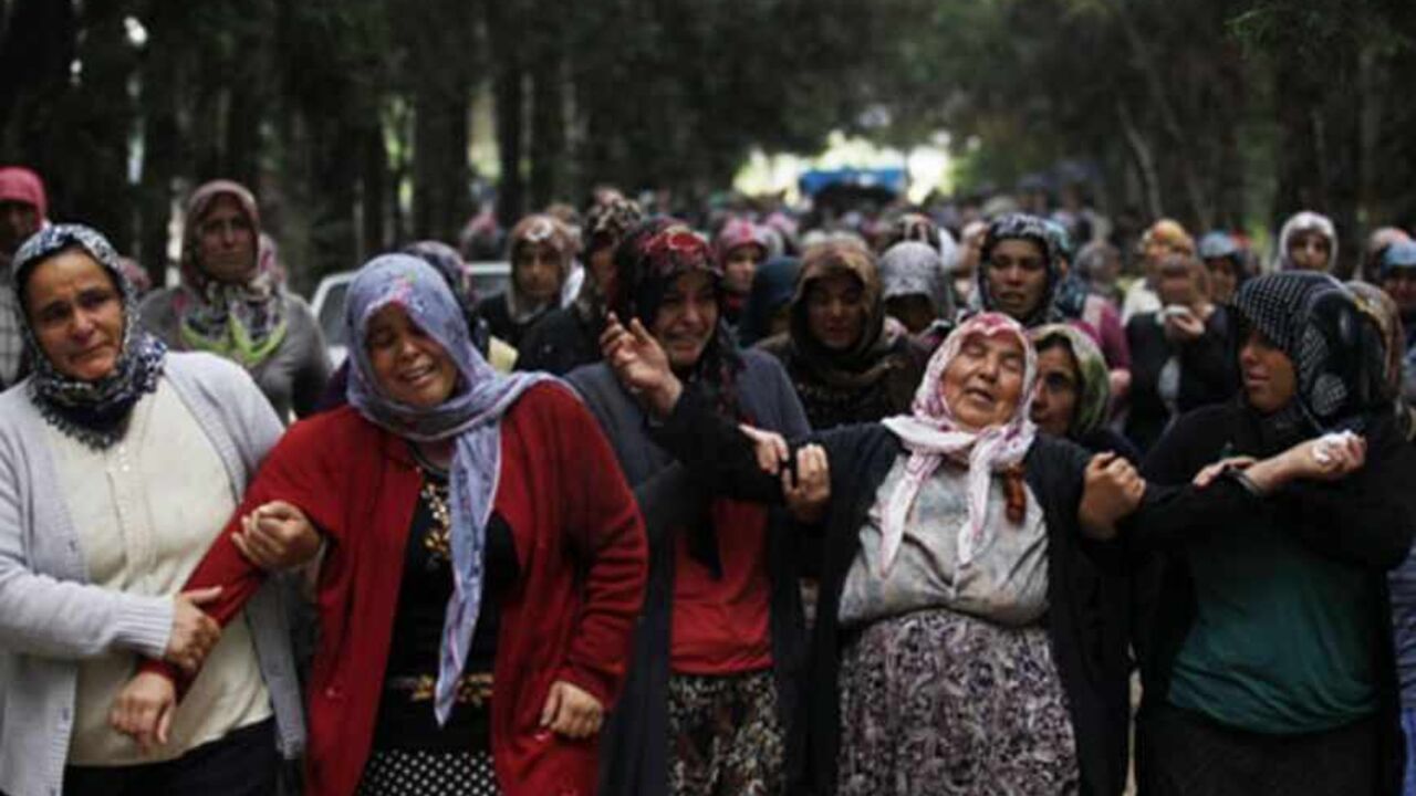 Relatives of Ahmet Uyan, 45, and Ahmet Ceyhan, 23, who were killed in yesterday's car bombings, mourn in the town of Reyhanli of Hatay province near the Turkish-Syrian border May 12, 2013. Turkey said on Sunday it believed fighters loyal to Syrian President Bashar al-Assad were behind twin car bombings that killed 46 people in a Turkish border town. Foreign Minister Ahmet Davutoglu said those involved in the bombings in Reyhanli on Saturday were thought also to have carried out an attack on the Syrian coast