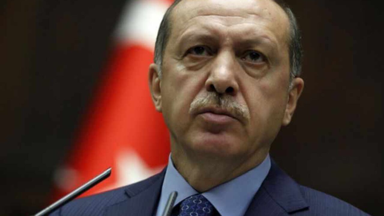 Turkey's Prime Minister Tayyip Erdogan addresses members of parliament from his ruling AK Party (AKP) during a meeting at the Turkish parliament in Ankara May 7, 2013. REUTERS/Umit Bektas (TURKEY - Tags: POLITICS) - RTXZDDJ