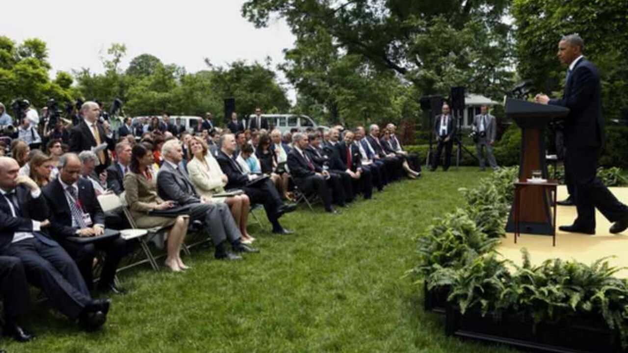 U.S. President Barack Obama (R) and Turkish Prime Minister Recep Tayyip Erdogan hold a joint news conference in the White House Rose Garden in Washington, May 16, 2013.  REUTERS/Kevin Lamarque (UNITED STATES  - Tags: POLITICS)   - RTXZPGI