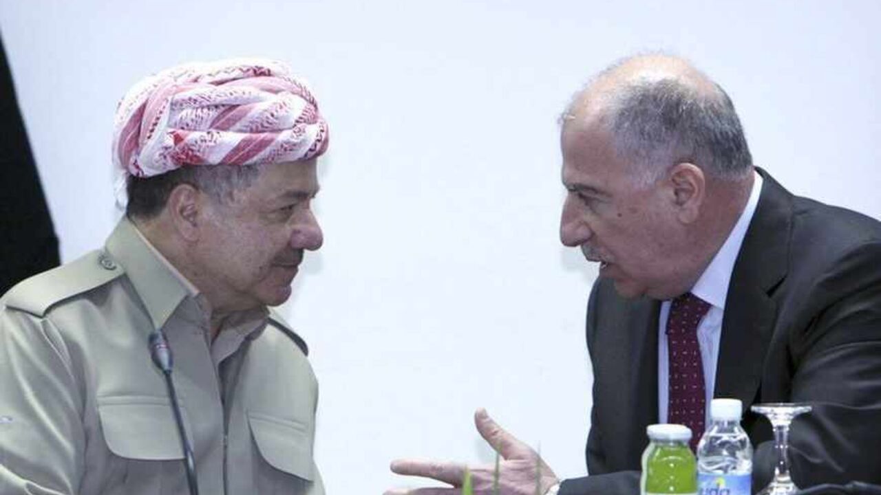 Iraq's Parliament Speaker Osama al-Nujaifi (R) meets with Iraqi Kurdish President Masoud Barzani (L) in Baghdad, July 7, 2013.  Barzani visited Baghdad on Sunday for the first time in more than two years, in a symbolic step to resolve disputes between the central government and the autonomous region over land and oil. The visit follows an equally rare trip by Iraqi Prime Minister Nuri al-Maliki who met Barzani in Kurdistan last month, breaking ice between leaders who have repeatedly accused each other of vi