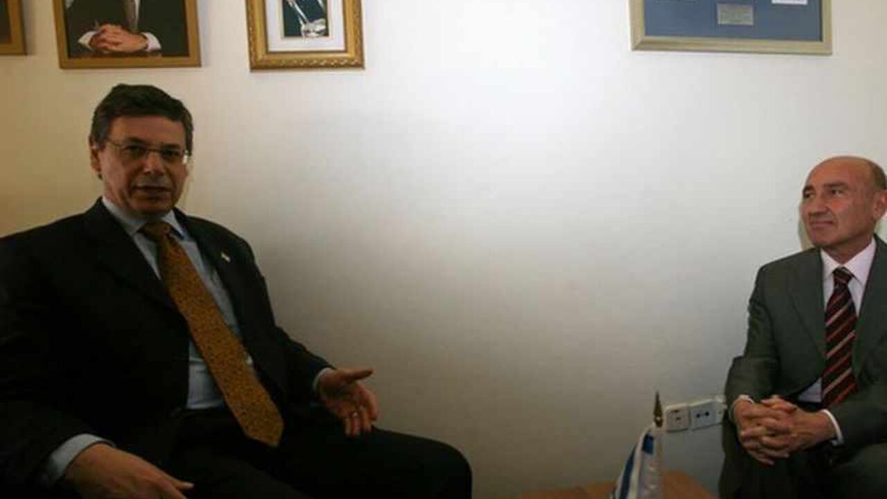 Israel's Deputy Foreign Minister Danny Ayalon (L) meets Turkey's ambassador to Israel Ahmet Oguz Celikkol at the Knesset, the Israeli parliament, in Jerusalem January 11, 2010. Israel issued a strong condemnation of Turkish Prime Minister Tayyip Erdogan on Monday, saying his often fierce public criticism of its policies could undermine relations. Israeli Defence Minister Ehud Barak will pay a one-day visit to Turkey on Sunday, Turkish and Israeli officials said, a trip that could help mend frayed ties betwe