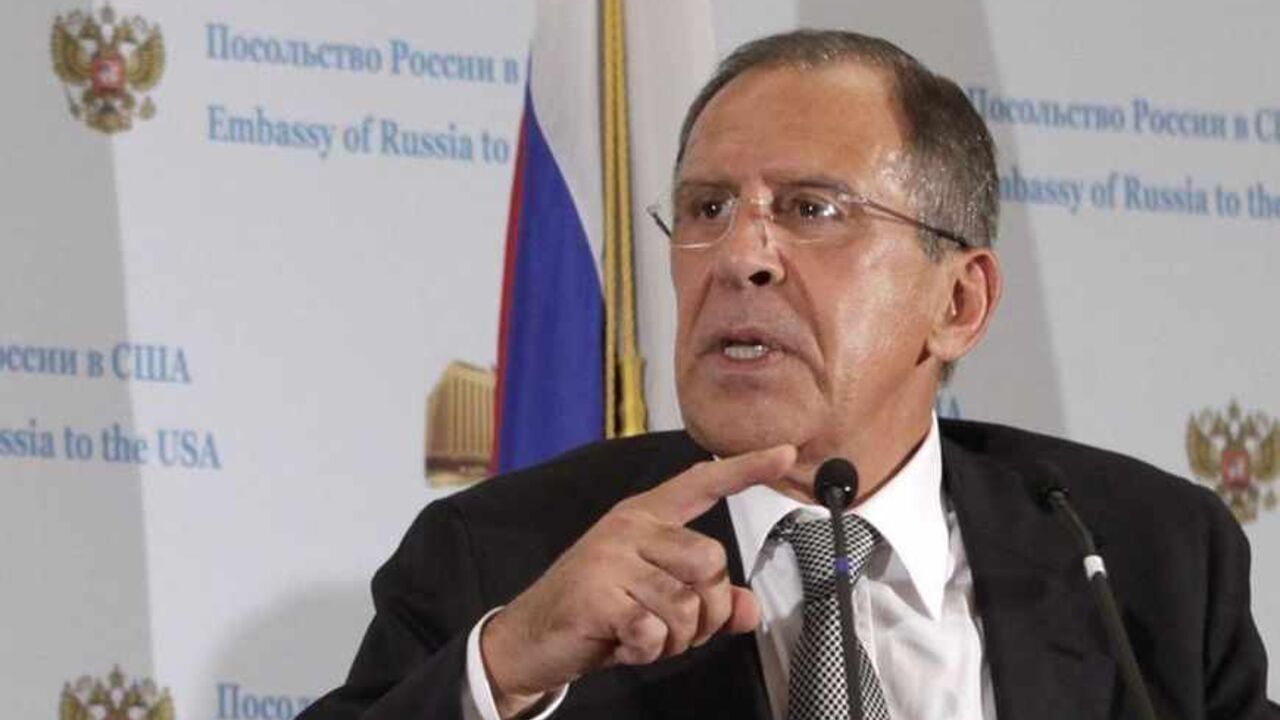 Russia's Foreign Minister Sergey Lavrov (R) and Defense Minister Sergey Shoygu hold a joint news conference at the Russian embassy in Washington after their meeting with U.S. Secretary of State John Kerry and Secretary of Defense Chuck Hagel, August 9, 2013. REUTERS/Yuri Gripas (UNITED STATES - Tags: MILITARY POLITICS) - RTX12FAI