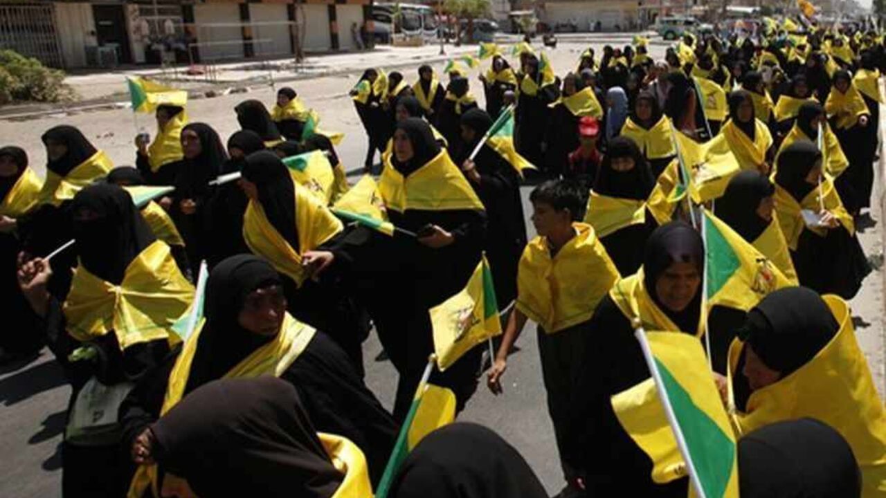 Women march during a rally to mark "Al Quds" or Jerusalem Day in Baghdad, August 2, 2013.   REUTERS/Saad Shalash(IRAQ - Tags: CIVIL UNREST) - RTX12859