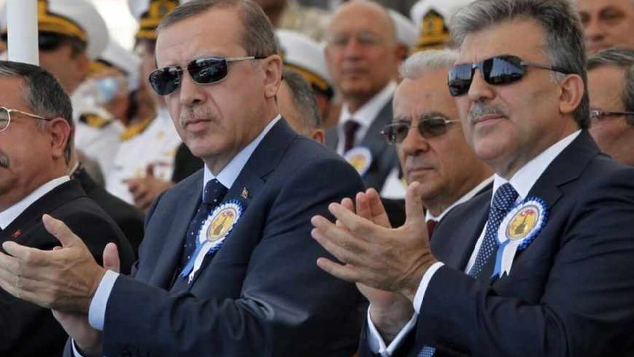 Turkey's President Abdullah Gul (R) and Turkey's Prime Minister Recep Tayyip Erdogan attend a delivery ceremony for the first nationally designed combat ship TCG Heybeliada at the Tuzla Naval shipyard in Istanbul September 27, 2011.  REUTERS/Osman Orsal (TURKEY - Tags: POLITICS MILITARY) - RTR2RWLG