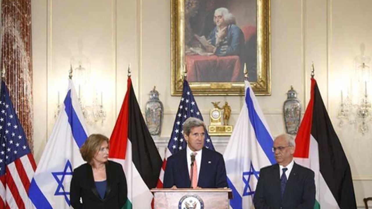 U.S. Secretary of State John Kerry (C) announces further peace talks at a news conference with Israel's Justice Minister Tzipi Livni (L) and chief Palestinian negotiator Saeb Erekat (R) at the State Department in Washington, July 30, 2013. Israel and the Palestinians will seek to reach a peace agreement within nine months and negotiators will meet again within two weeks after holding a "positive" first round of talks, Kerry said on Tuesday. REUTERS/Jonathan Ernst  (UNITED STATES - Tags: POLITICS) - RTX12516
