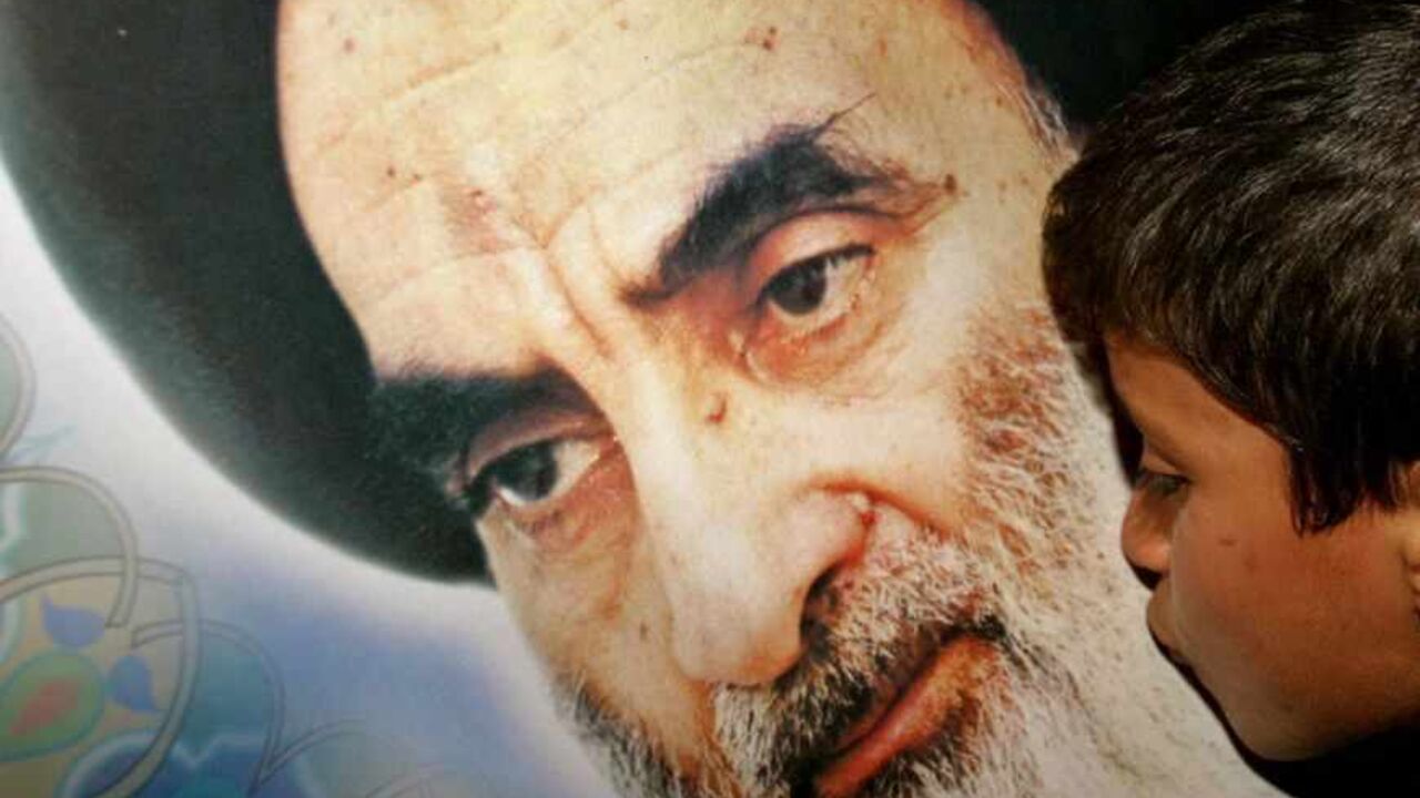 An Iraqi Shi'ite Muslim boy kisses a poster of the Ayatollah Ali al-Sistani in the town of Karbala, some 110 km south from the Iraqi capital Baghdad, early February 6, 2004. Iraq's most powerful Shi'ite cleric, Ayatollah Ali al-Sistani, survived an assassination bid on Thursday when gunmen opened fire on his entourage in the sacred streets of Najaf, a security aide said. The assassination attempt comes days before a team of United Nations electoral experts is due to arrive in the country to assess the feasi