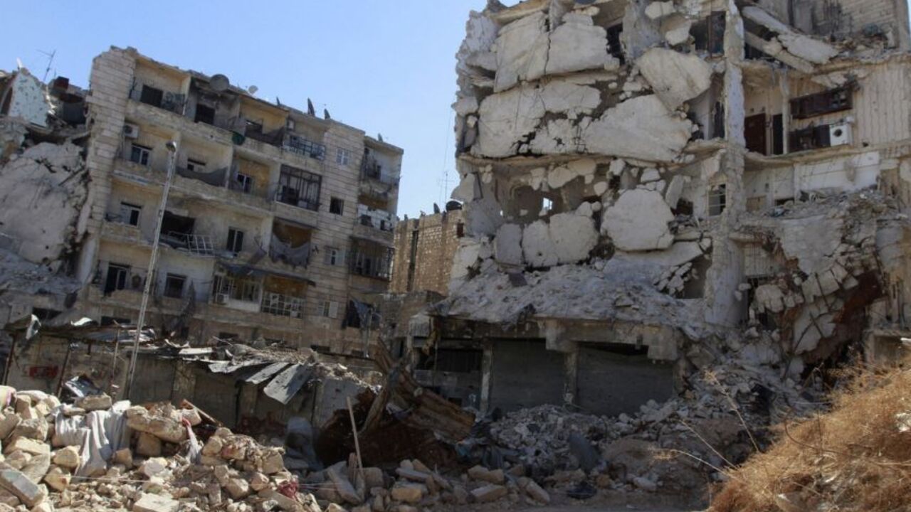 A view shows damaged buildings in Aleppo's Karm al-Jabal district October 6, 2013. REUTERS/Nour Kelze (SYRIA - Tags: CONFLICT CIVIL UNREST) - RTR3FNSO