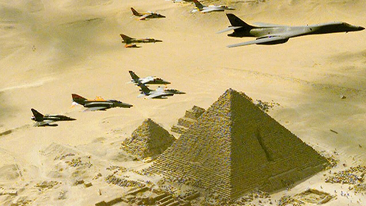 A U.S. Air Force B-1B bomber is followed by fighter planes above one of the three great pyramids of Giza, Egypt October 25, during a demonstration flight which is part of the Bright Star 99 military exercises. Some 73,000 military personnel from eleven countries are taking part in the exercises in the Egyptian Western desert and the Mediterranean.

FMS/ZDC - RTRRTL5