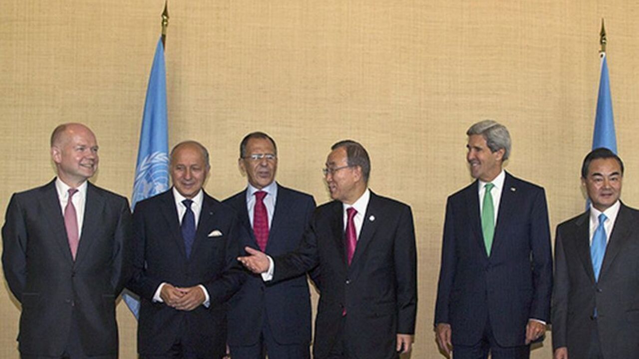 Foreign Ministers representing the permanent five member countries of the United Nations Security Council pose together, which includes (from L-R) Britain's Foreign Secretary William Hague, France's Foreign Minister Laurent Fabius, Russia's Foreign Minister Sergey Lavrov, United Nations Secretary General Ban Ki-moon, U.S. Secretary of State John Kerry and China's Foreign Minister Wang Yi, on the sidelines of the UN General Assembly at UN Headquarters in New York September 25, 2013.   REUTERS/Brendan McDermi
