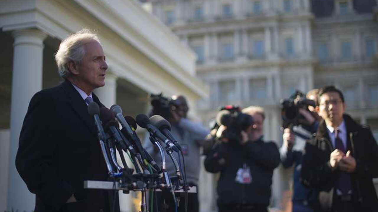 US Senator Bob Corker, R-Tennessee, talks with reporters at the White House after a meeting on Iran with President Obama in Washington, DC, November 19, 2013. US President Barack Obama met with key Senate committee chairpersons and ranking members about Iran, urging them to hold off on more sanctions against the regime in Tehran over its nuclear program.    AFP PHOTO / Jim WATSON        (Photo credit should read JIM WATSON/AFP/Getty Images)