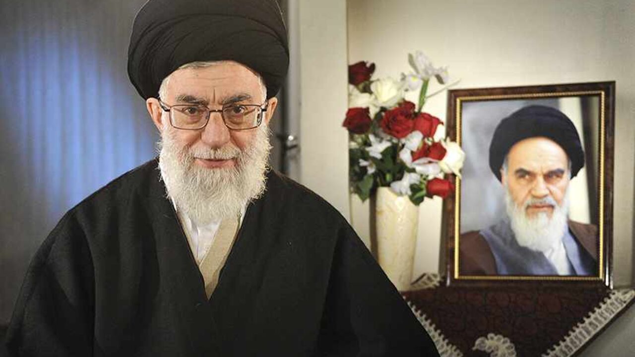 EDITORS' NOTE: Reuters and other foreign media are subject to Iranian restrictions on their ability to film or take pictures in Tehran. 

Iran's Supreme Leader Ayatollah Ali Khamenei sits next to a portrait of late leader Ayatollah Ruhollah Khomeini while taking part in a television live programme in Tehran on the occasion of the Iranian New Year March 21, 2011. REUTERS/Leader.ir/Handout (IRAN - Tags: POLITICS PROFILE) THIS IMAGE HAS BEEN SUPPLIED BY A THIRD PARTY. IT IS DISTRIBUTED, EXACTLY AS RECEIVED BY 