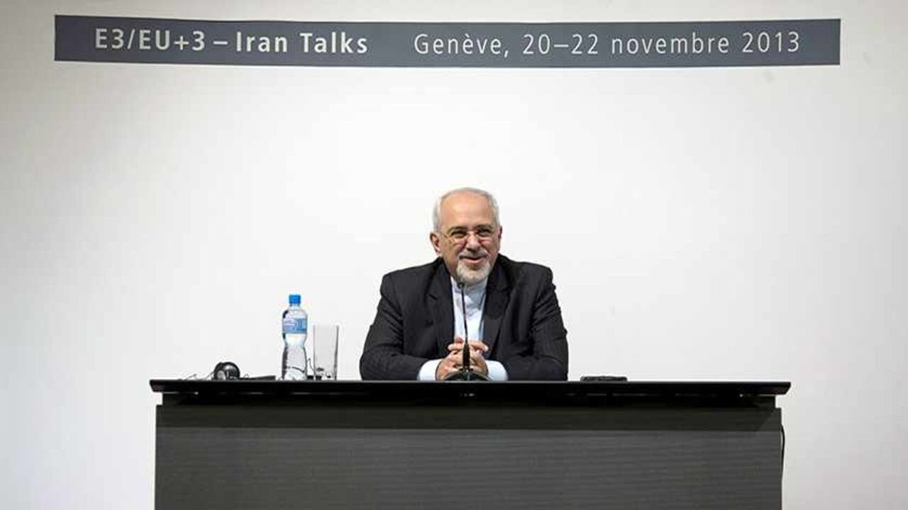 Iranian Foreign Minister Mohammad Javad Zarif speaks to the media about the deal that has been reached between six world powers and Iran at the International Conference Centre of Geneva in Geneva November 24, 2013. Iran and six world powers reached a breakthrough deal early on Sunday to curb Tehran's nuclear programme in exchange for limited sanctions relief, in what could be the first sign of an emerging rapprochement between the Islamic state and the West.      REUTERS/Carolyn Kaster/Pool    (SWITZERLAND 