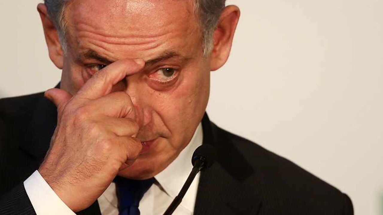 Israeli Prime Minister Benjamin Netanyahu listens to a question during a joint news conference with his Italian counterpart Enrico Letta at the end of a bilateral meeting at Villa Madama in Rome December 2, 2013.  REUTERS/Alessandro Bianchi  (ITALY - Tags: POLITICS) - RTX1616K