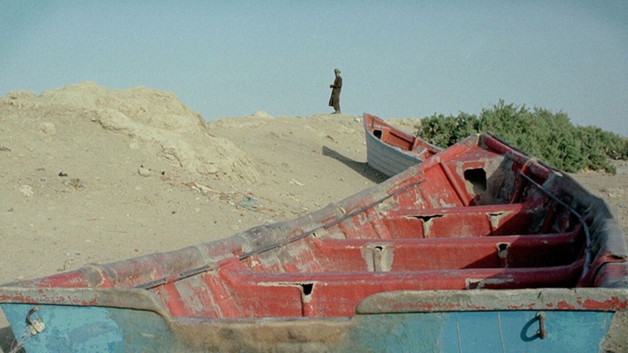 A fisherman looks out at the dried up Hamoun lake which used to serve
as a water supply for agriculture outside Zabol in south eastern Iran
July 17, 2001. Iran's Sistan-Baluchistan province is suffering from a
third consecutive year of drought which the United Nations says has
cost the country $2.6 billion this year, up from $1.7 billion last
year. Local officials say without rain remaining water sources will dry
up by December.

CJF/ns - RTRKVOZ