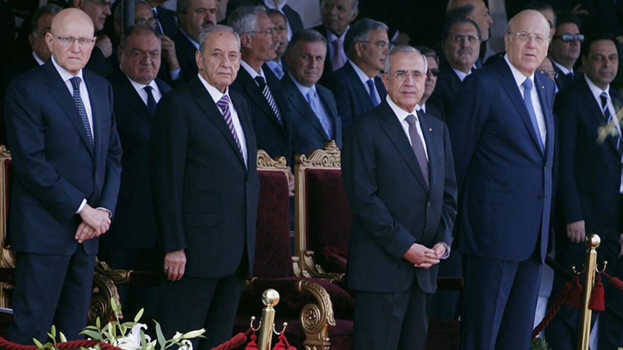 (From L to R) Lebanon's Prime Minister-designate Tammam Salam, parliamentary speaker Nabih Berri, Lebanon's President Michel Suleiman and caretaker Prime Minister Najib Mikati attend a military parade to celebrate the 70th anniversary of Lebanon's independence in downtown Beirut November 22, 2013. REUTERS/Mohamed Azakir (LEBANON - Tags: ANNIVERSARY POLITICS MILITARY) - RTX15OH8